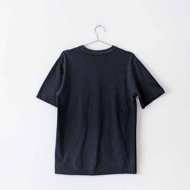 Back of vintage Black cotton three button henley t-shirt.