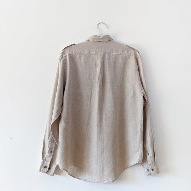 Back of Oatmeal long sleeve linen shirt with collar and yoke.