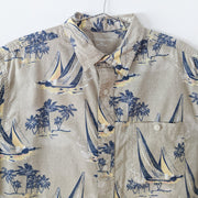 Beige Croft & Barrow Button-up Short Sleeve Shirt with Large Dark Blue Boats and Palm Trees. Size Medium. Close up of Collar.