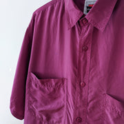 Vintage Reputation Silk Button-up Short Sleeve Shirt in Purple/Plum. Two Chest Pockets, Monochrome Buttons, Collar. Medium.