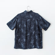 Bamboo Rayon/Cotton Button-up Short Sleeve Hawaiian Shirt. Black with Blue Leaf Print. Penmans, Men’s Medium. Back View.