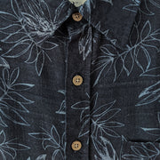 Button-up Short Sleeve Hawaiian Shirt. Black Fabric with Blue Leaves Outlined with Light Brown Buttons.