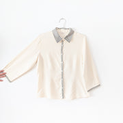 Vintage Lex-i-con Womens Button-up ¾ Sleeve Shirt. Cream with Black Embroidery at Collar, Cuffs and Front Button Opening.
