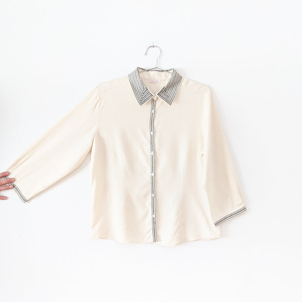 Vintage Lex-i-con Womens Button-up ¾ Sleeve Shirt. Cream with Black Embroidery at Collar, Cuffs and Front Button Opening.