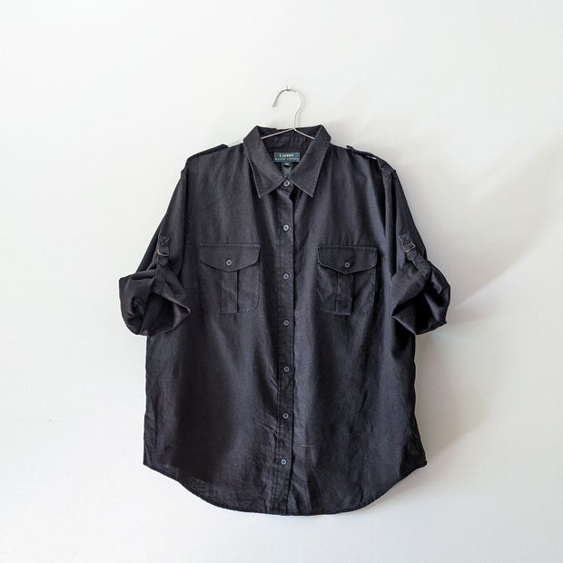 Black button-up linen shirt, shown with sleeves looped up.