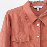 Close up of Collar and Light Rust Orange Linen Fabric on Button-up Shirt. Conrad C Collection, Size 12, Women’s. 