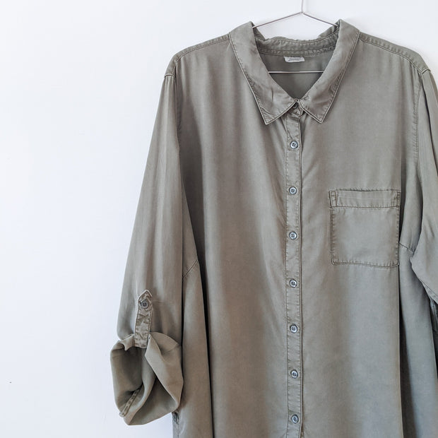 Close up of Arms Rolled up with Tab. Faded Olive Green Lyocell Long Sleeve Button-up Shirt. d/C Jeans, Size 4X Women’s.