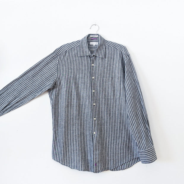 Linen and Cotton Button-up Long Sleeve Shirt in Dark Grey with Narrow White Vertical Stripes. Bill Blass Men’s Large. Arm Extended.