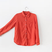 Rosy Orange Linen Button-up Long Sleeve Shirt. Ruby Rosa Women’s 8. One Pocket, Mother of Pearl Buttons. Sleeve Width View.