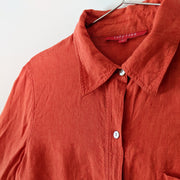 Close up of Collar, Mother of Pearl Buttons and Linen Fabric on Button-up Long Sleeve Shirt, Bright Rosy Orange. Ruby Rosa 8.