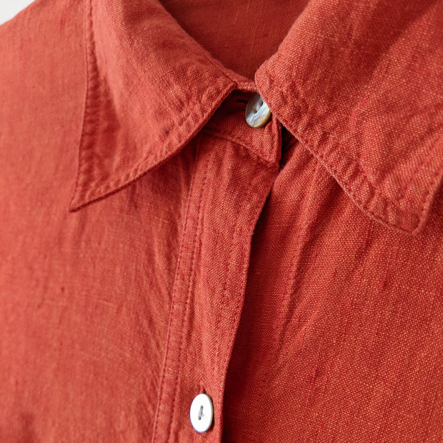 Close up of Collar, Mother of Pearl Buttons and Linen Fabric on Button-up Long Sleeve Shirt, Bright Rosy Orange. Ruby Rosa 8.