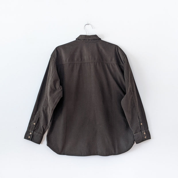 Wilfred Free Button-up Long Sleeve Corduroy Shirt in Dark Green with Collar, Pocket and Light Brown Buttons. Back of Shirt. 