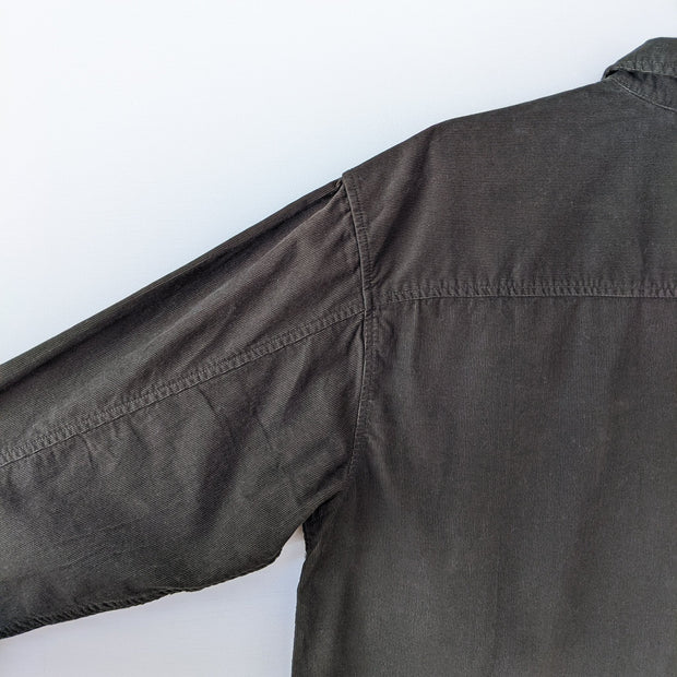 Wilfred Free Button-up Long Sleeve Corduroy Shirt. Dark Green, Back of Arms have Seam extending from Yoke to Cuff. Close-up