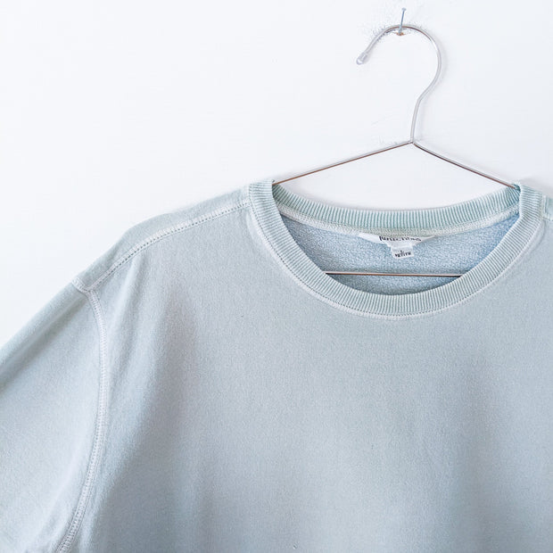 Close-up of Vintage Northern Reflections Crewneck Sweatshirt in Light Mint/Seafoam Green. Women's Petite Large, 100% Cotton.