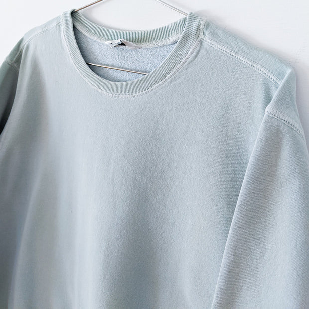 Close-up of Vintage Northern Reflections Crewneck Sweatshirt in Light Mint/Seafoam Green. Women's Petite Large, 100% Cotton.