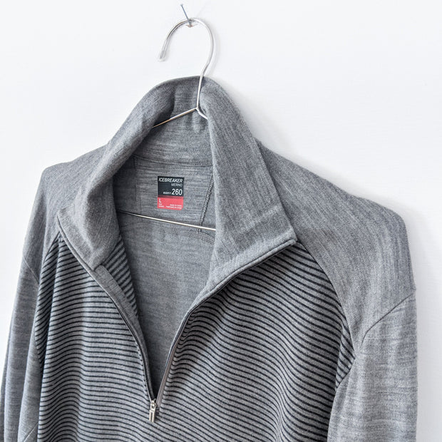 Icebreaker Grey Mock Neck Sweater. Half-Zip Neckline Unzipped. Horizontal Thin Black Stripes on Torso. Merino Wool, Men’s Large.