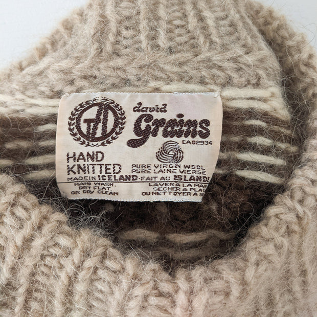 Label on Vintage 70's Lopapeysa Hand Knit Wool Sweater. Reads: David Grains, Hand Knitter, Made in Iceland, Pure Virgin Wool