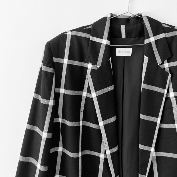 Close up of Black and White Windowpane Print on Vintage Bianca Blazer. Notch Lapel, 100% Viscose Rayon. Canada.