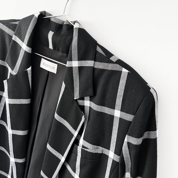 Close up of Shoulder on Black and White Windowpane Print, Vintage Bianca Blazer. Notch Lapel, 100% Viscose Rayon. Canada.