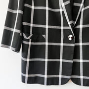 Close up of Sleeve Cuff, Pocket and Black and White Button on Black and White Windowpane Print, Vintage Bianca Blazer.