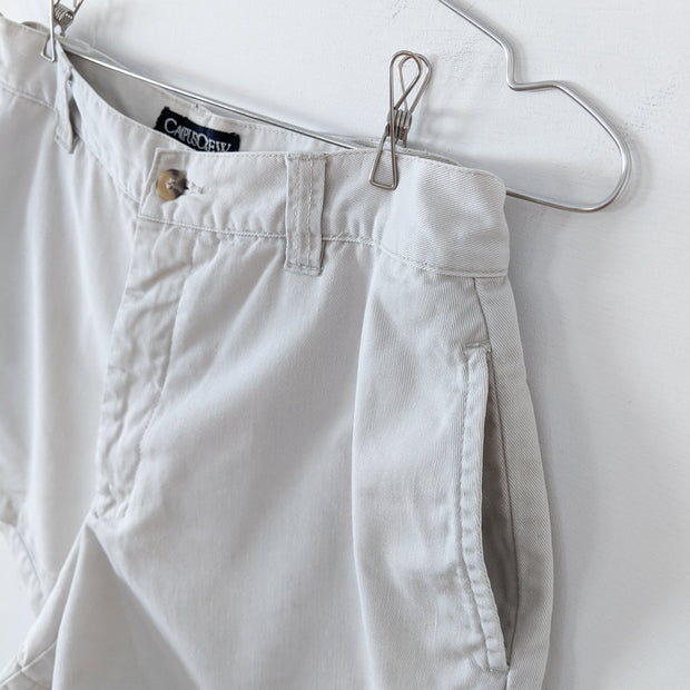 Beige High Waisted Khaki Shorts. Campus Crew Women’s 8. Greige/Off-White Cotton Shorts, Close up, Side Slash Pocket. Fold and Fray.