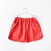 Magic Mountain Preshrunk Cotton Shorts in Bright Red-Orange, Women’s Large. Elastic Waist, Curved Hem at Side, Pockets.