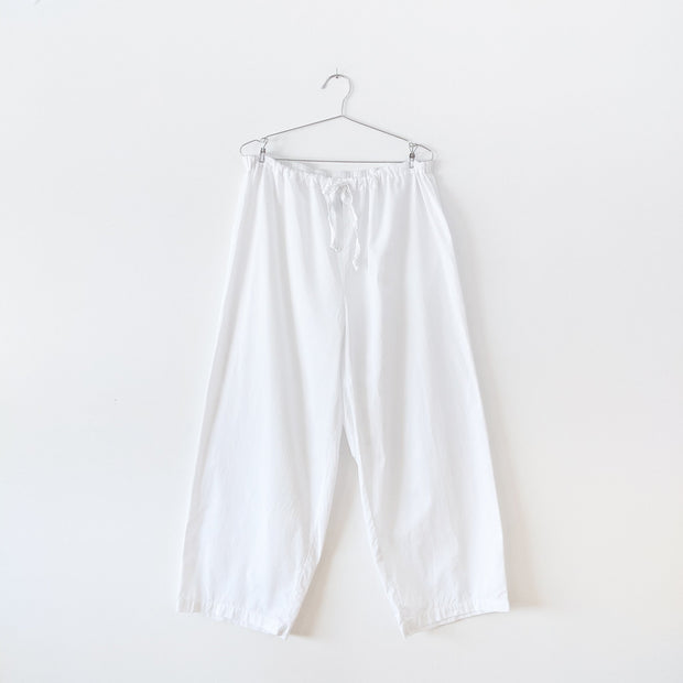 White cotton pyjama pants with straight leg and drawstring and elastic waist. Secondhand gender and size inclusive clothing from Fold and Fray.