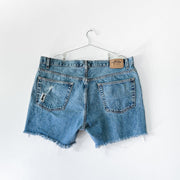 Levi’s Cut-off High-waisted Denim Shorts, Distressed Back Pocket. Levi’s Signature Women’s Blue Jean Short.