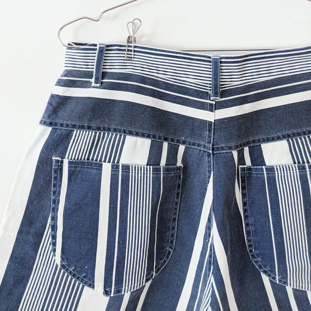 Vintage Navy/White Vertical Stripe (Varied Size) High Waisted Denim Shorts. Close-up of Back Pockets and Varied-Size Stripes.