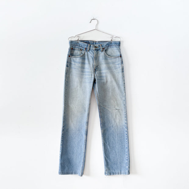 Vintage Levi’s 516 32X32 Slim Fit Straight Leg Faded Light Blue Jeans, Fading at Thighs. Style 50516 0299, Made in Canada.