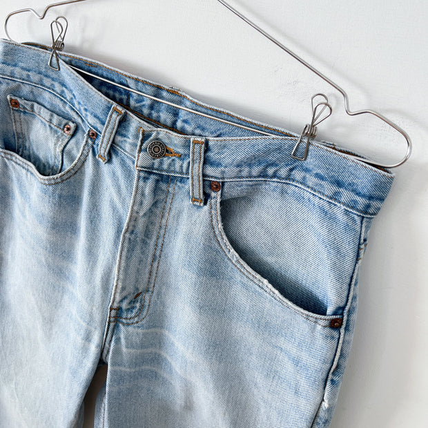 Vintage Levi’s 516 32X32 Slim Fit Straight Leg Jeans, Made in Canada. Faded Distressed Denim Fabric at Front Pockets.