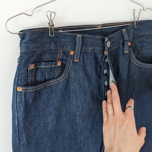 Levi's 501 Original Fit Dark Wash “Across A Plain” High-rise Blue Jean. Women's 28X30. Front Close-up Button-Fly.