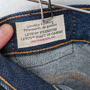 Levi's 501 Original Fit Dark Wash “Across A Plain” High-rise Blue Jean. Interior Label: Levi’s Premium, San Francisco, CAL