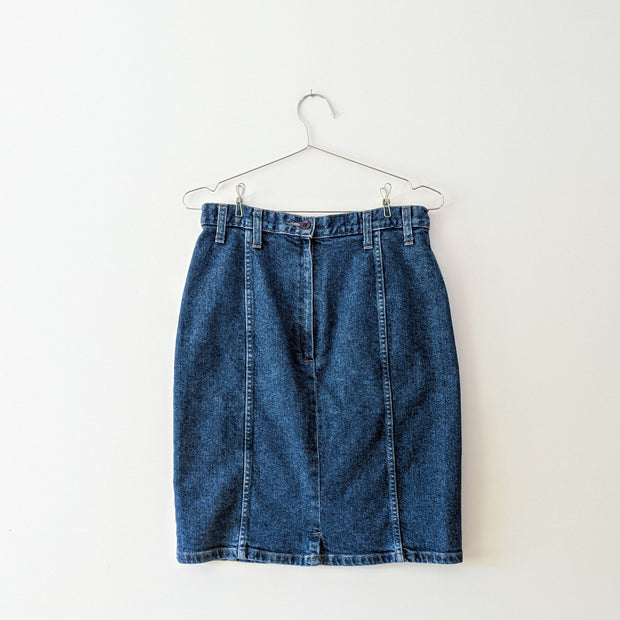 Vintage cotton denim knee-length skirt in Indigo Blue with zipper and button closure on the back.