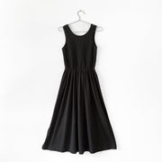 Shirred Sleeveless Black Dress, Scoop Neck, Full Skirt and Pockets. Vintage Clothing, Fold and Fray in Ontario Canada.