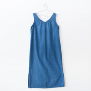 Vintage Panache Blue Denim Sleeveless Maxi Dress. Mid-Tone Solid Wash Blue, Bottom Side Slits, Scoop Neck. Made in Canada.