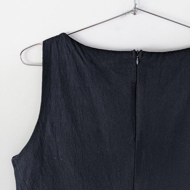 Close-up of Hidden Back Zipper on Vintage Black Romper, Sleeveless Cotton Wide-Leg Jumpsuit. Vintage Clothing Canada.