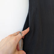 Close-up of Pocket on Vintage Black Romper. Sleeveless Cotton Wide-Leg Black Jumpsuit. Vintage Clothing Ontario Canada.