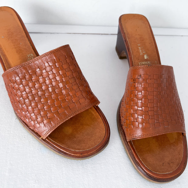 Close up of Orange-Brown Leather Vintage Woven Heeled Mule Saldal Shoes. Tight Leather Weave.