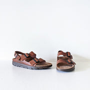 Chestnut Brown leather Mephisto sandals with two front straps and one back strap. 