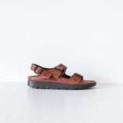 Side view of Chestnut Brown leather Mephisto sandals with two front straps and one back strap. 