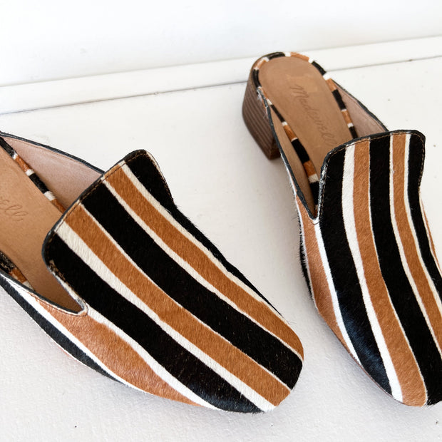 Close up of Calf Hair/Fur on Madewell Willa Loafer/Mule. Wide Black and Brown Stripes, Separated by Thin Cream Stripe.