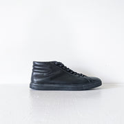 Sully Wong Black Leather Mid-Top Sneakers, SWJ 5 Mid Top Sneaker Men’s 9, Monochrome Black. Side View of One Sneaker.