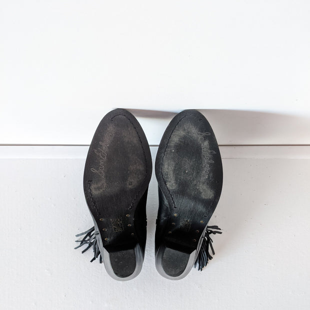 Shoe soles of Black leather heeled ankle booties with almond toe. Sam Edelman Black Louie Boot 8M. Secondhand from Fold and Fray.