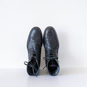 Top view of almond toe Black matte leather wingtip lace-up oxford boots.