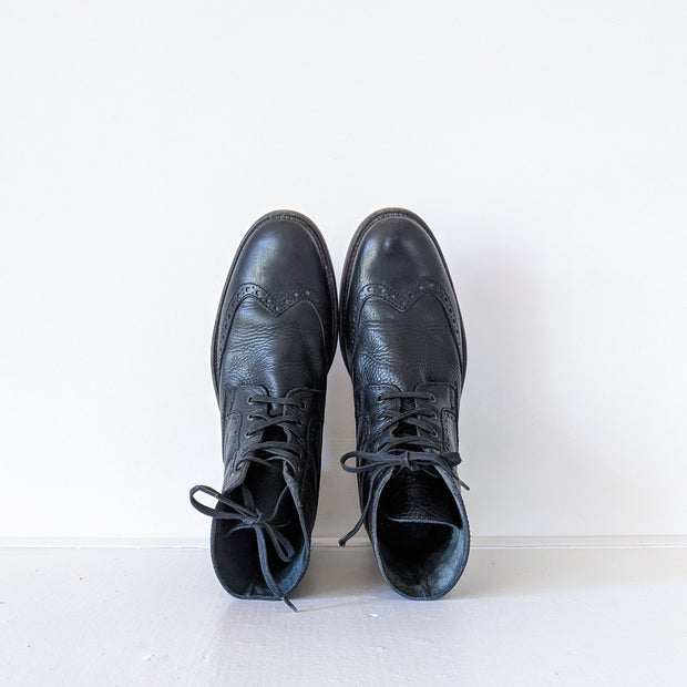 Top view of almond toe Black matte leather wingtip lace-up oxford boots.