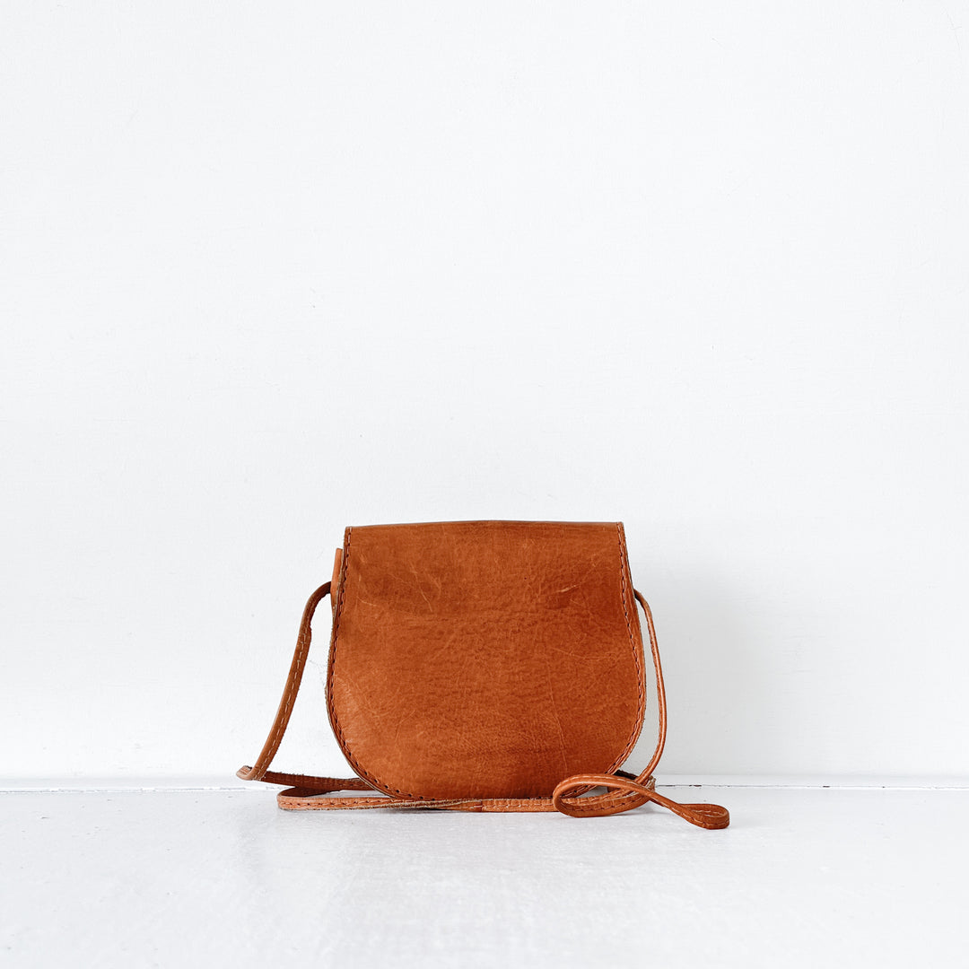 Brown leather crossbody saddle bag store