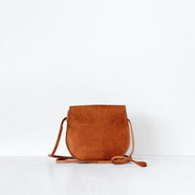 Back of Small Tan Leather Vintage Saddle Bag, Leather Vintage Purse with Flap. Golden Brown Leather Cross-body Bag.