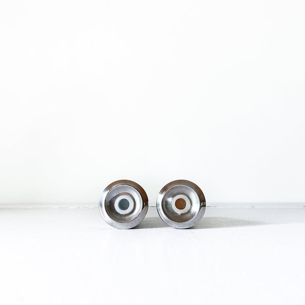 Bottom View of Plugs on Vintage Mid Century Modern Stainless Steel Salt and Pepper Shakers. Vintage Home Goods in Canada.